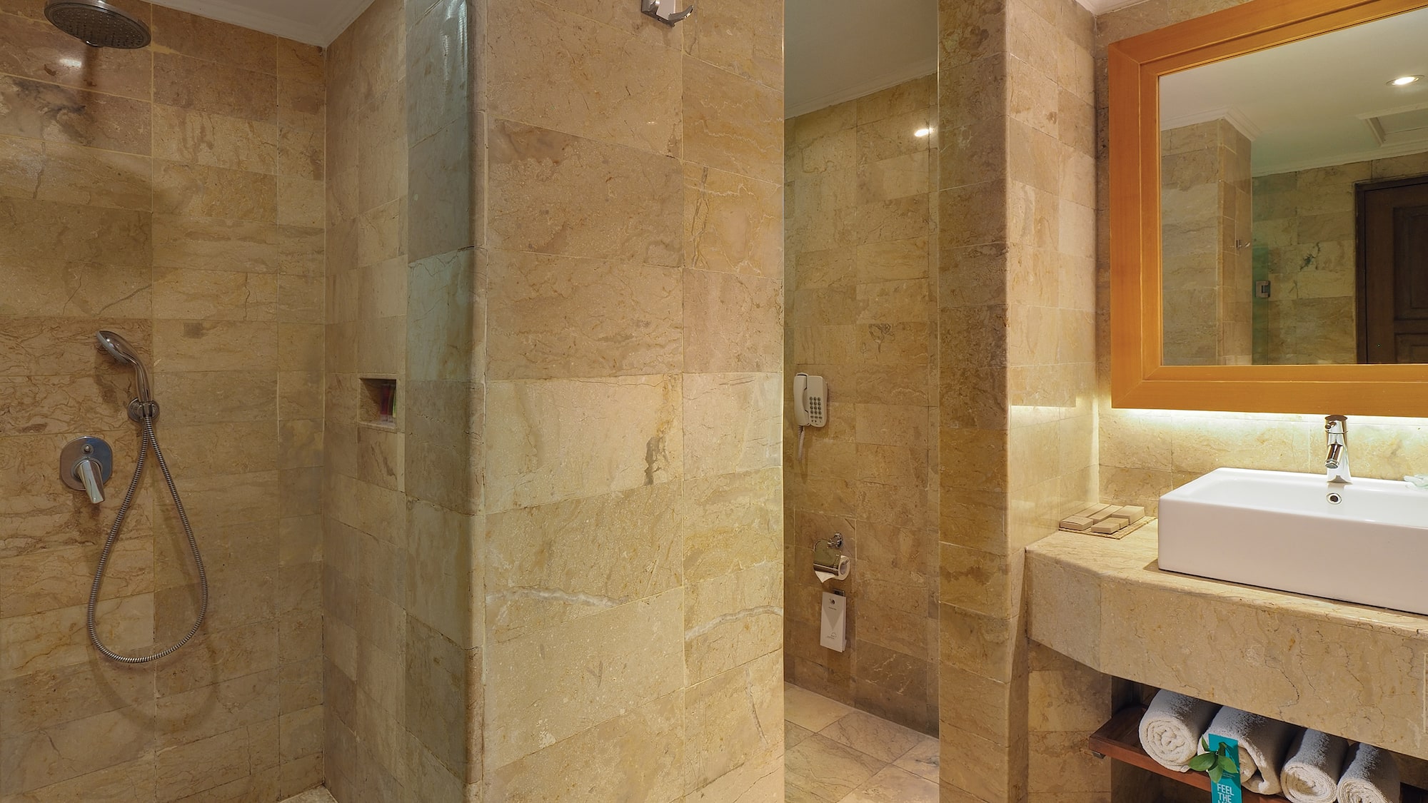 a bathroom with a sink and shower