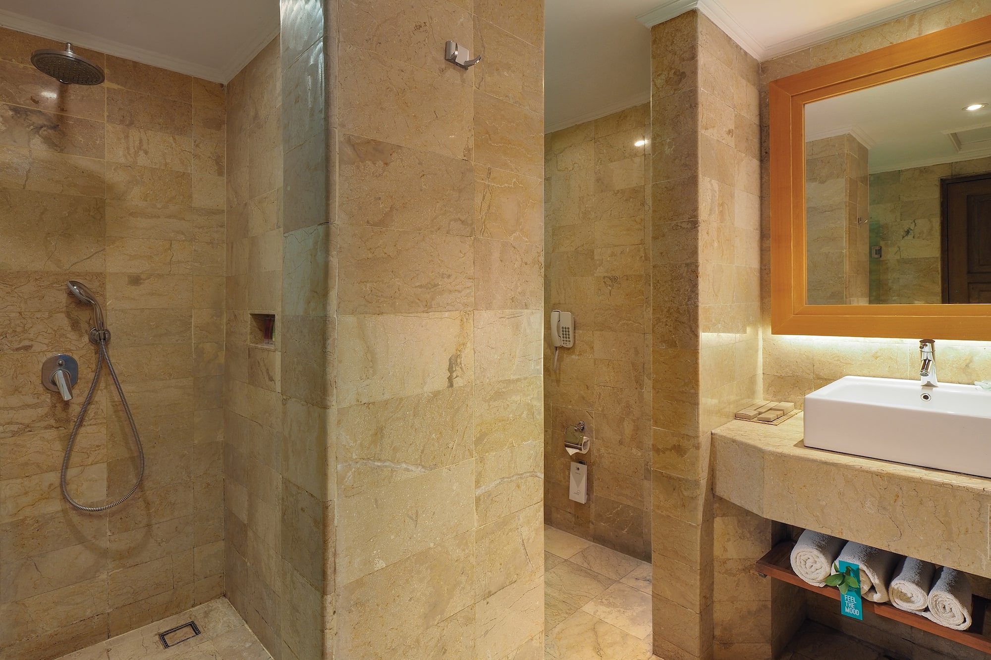 a bathroom with a sink and shower