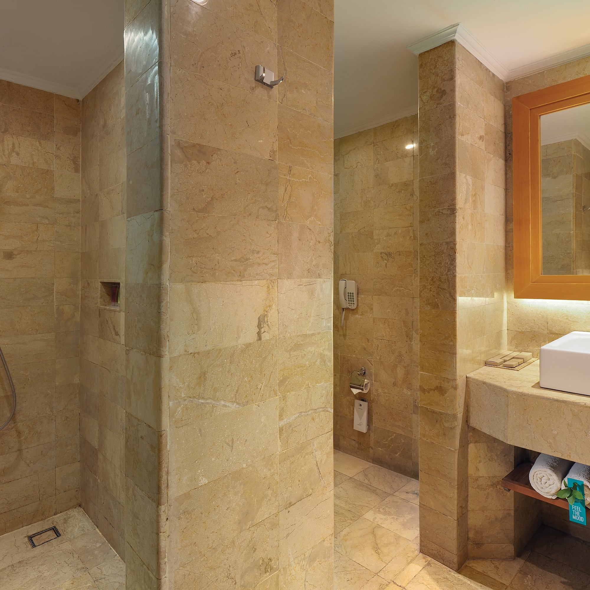 a bathroom with a sink and shower