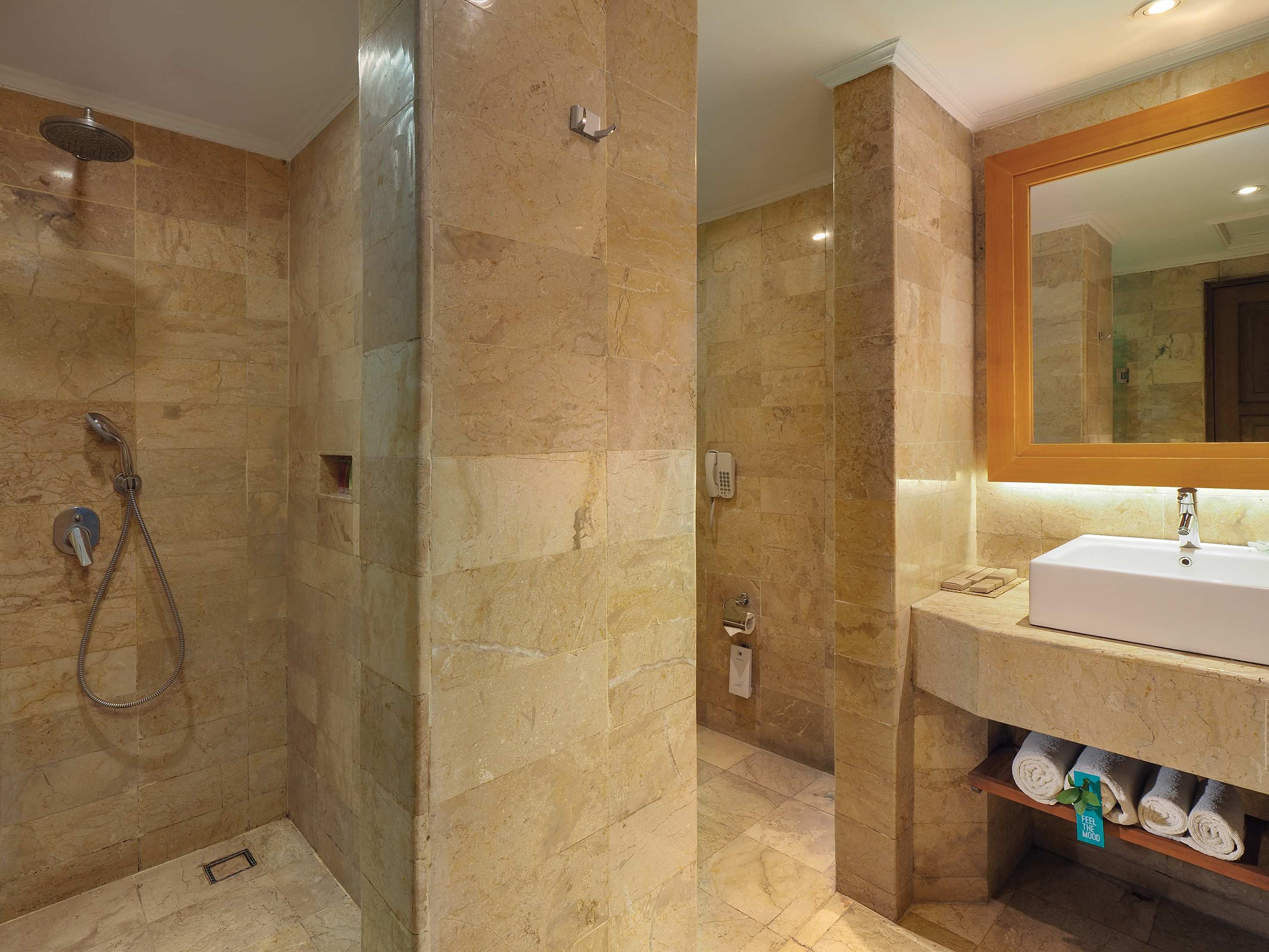 a bathroom with a sink and shower