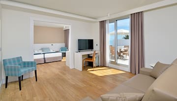 a room with a television and a table