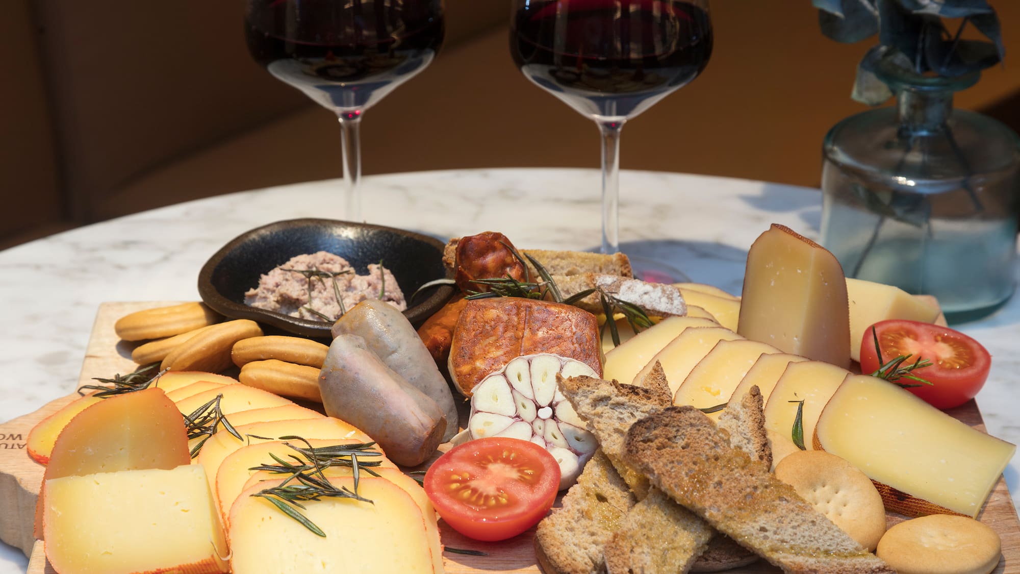 a plate of food and wine