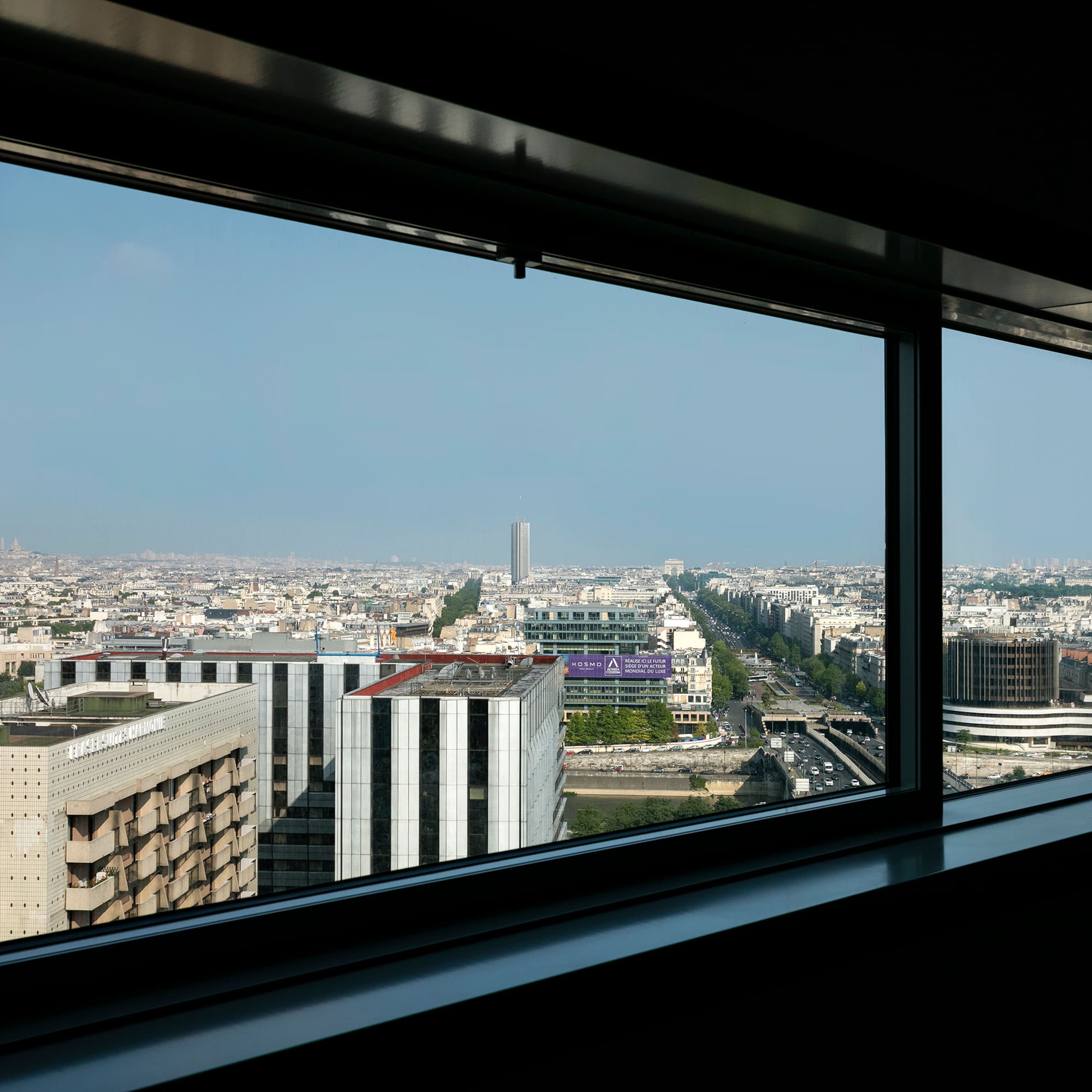 a window with a view of a city
