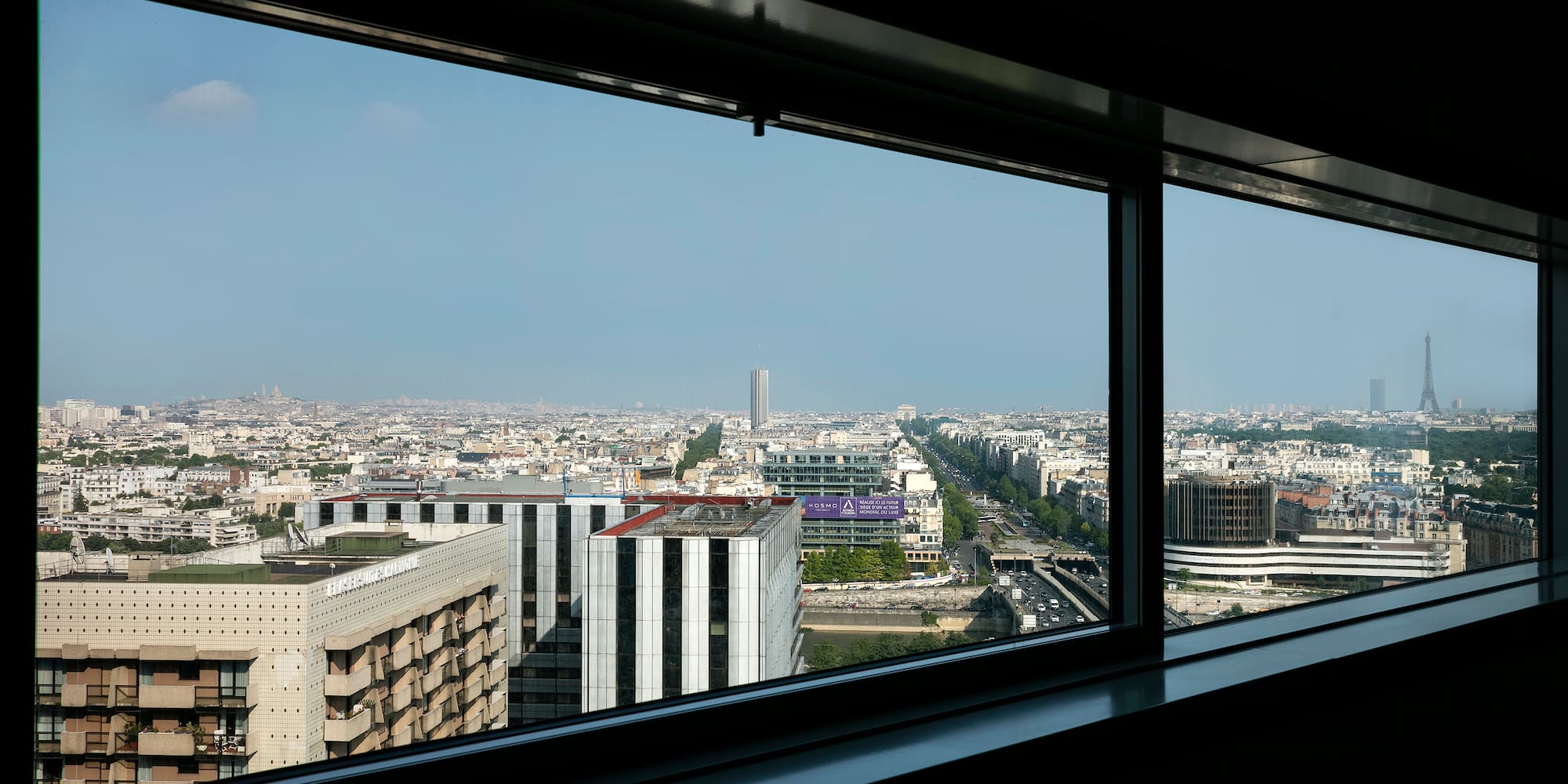 a window with a view of a city