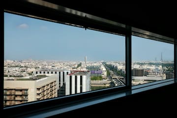 a window with a view of a city