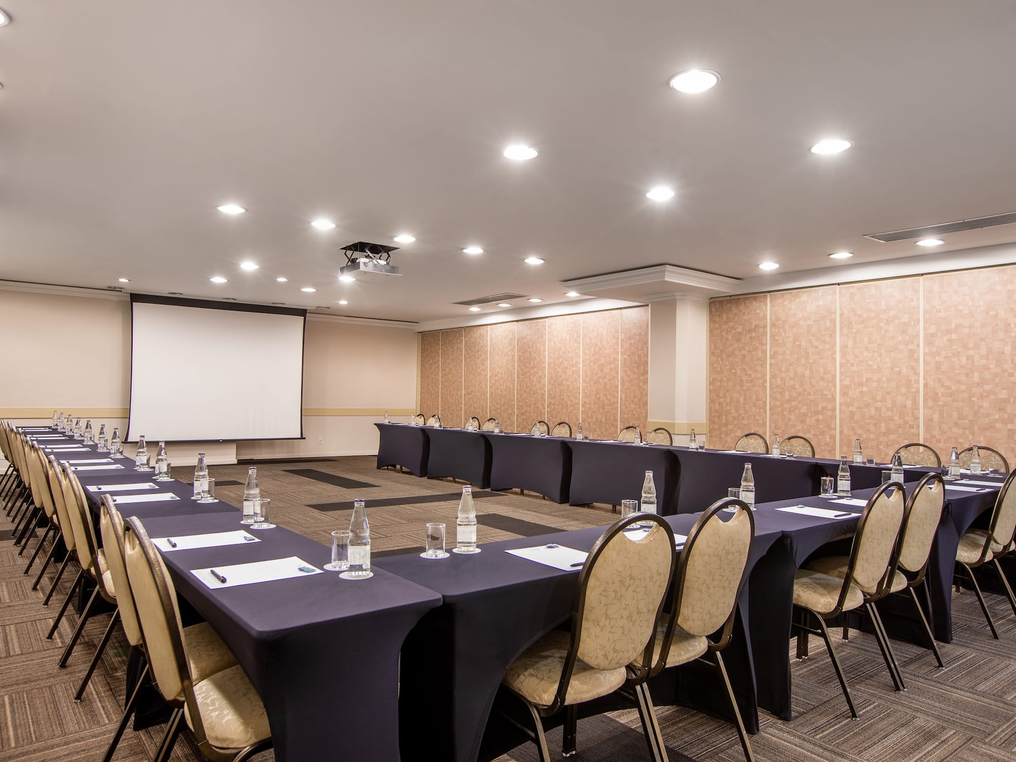 a room with tables and chairs