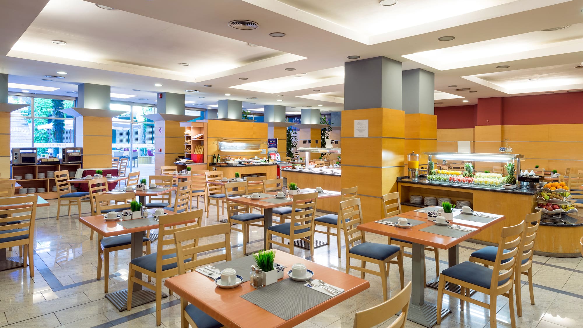 a restaurant with tables and chairs