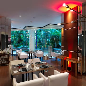 a restaurant with tables and chairs