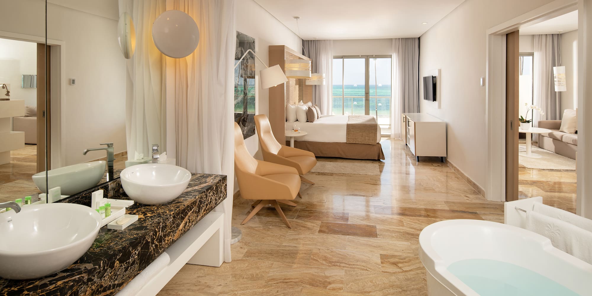 a bathroom with a bed and a bathtub