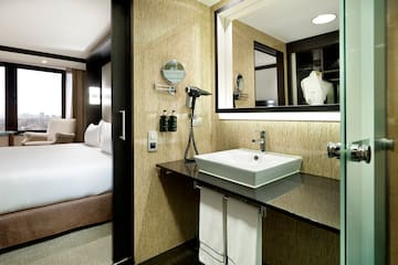 a bathroom with a mirror and a sink