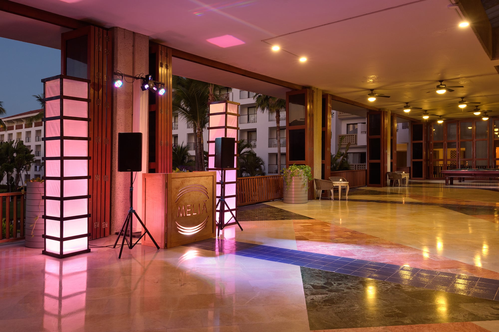 a room with a large screen and a large screen