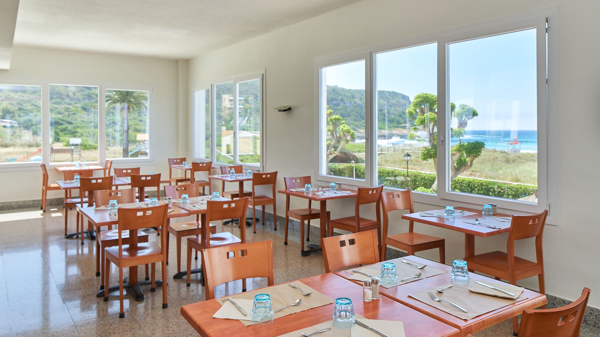 a room with tables and chairs