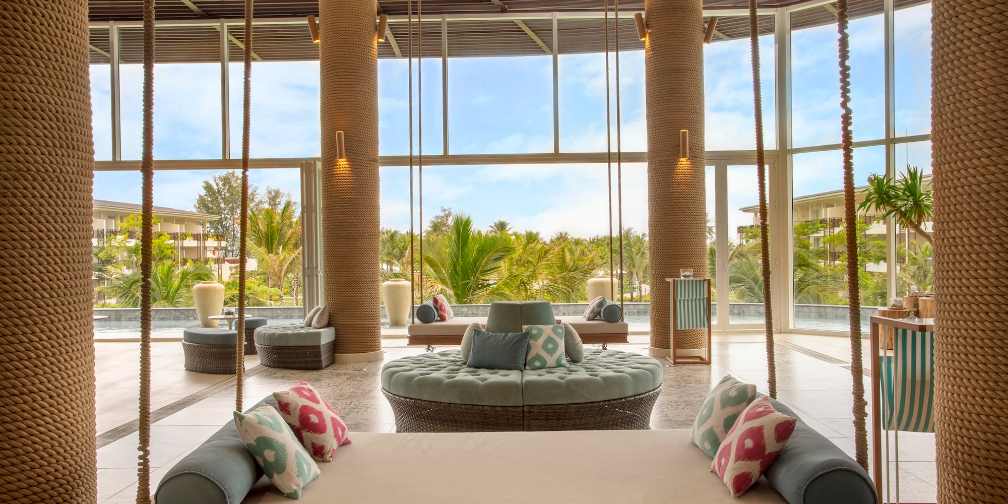 a large room with large windows and a large couch