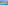 Aerial view of beachfront hotels, sandy beach, and clear turquoise water.