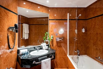 a bathroom with a sink and a shower