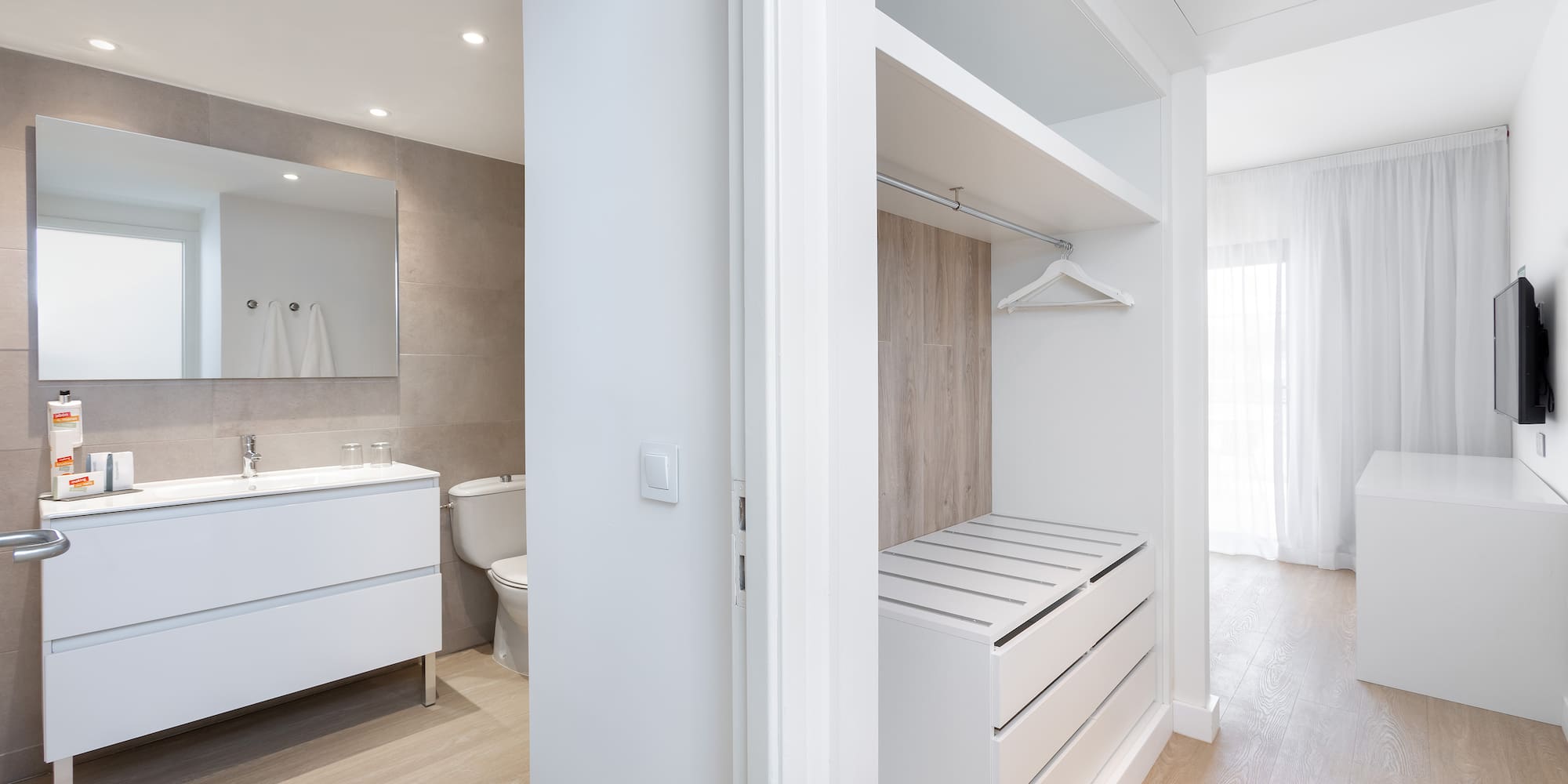 a white room with a closet and a toilet