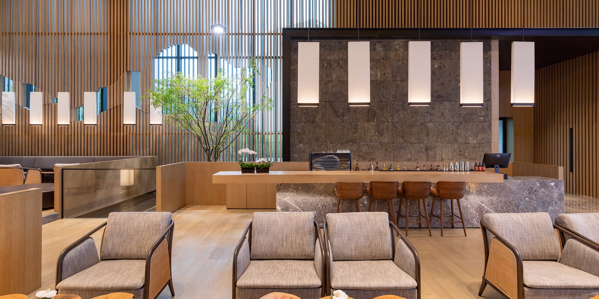 a room with chairs and tables