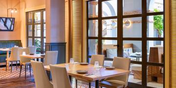 a room with tables and chairs