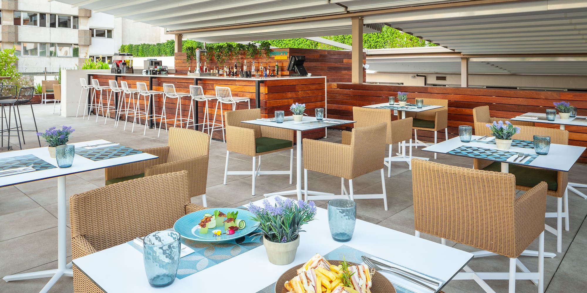 a table and chairs with food on it