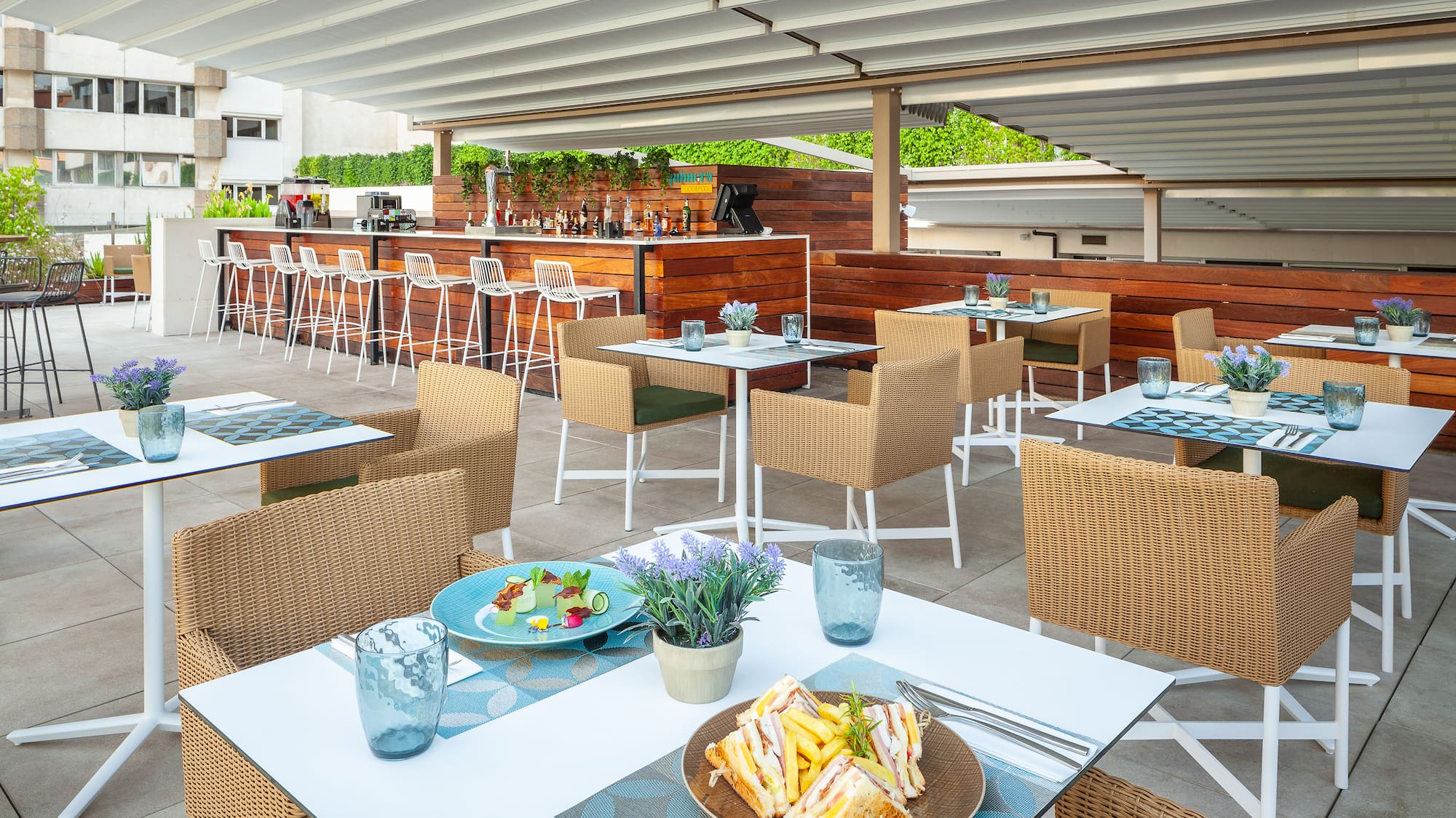 a table and chairs with food on it