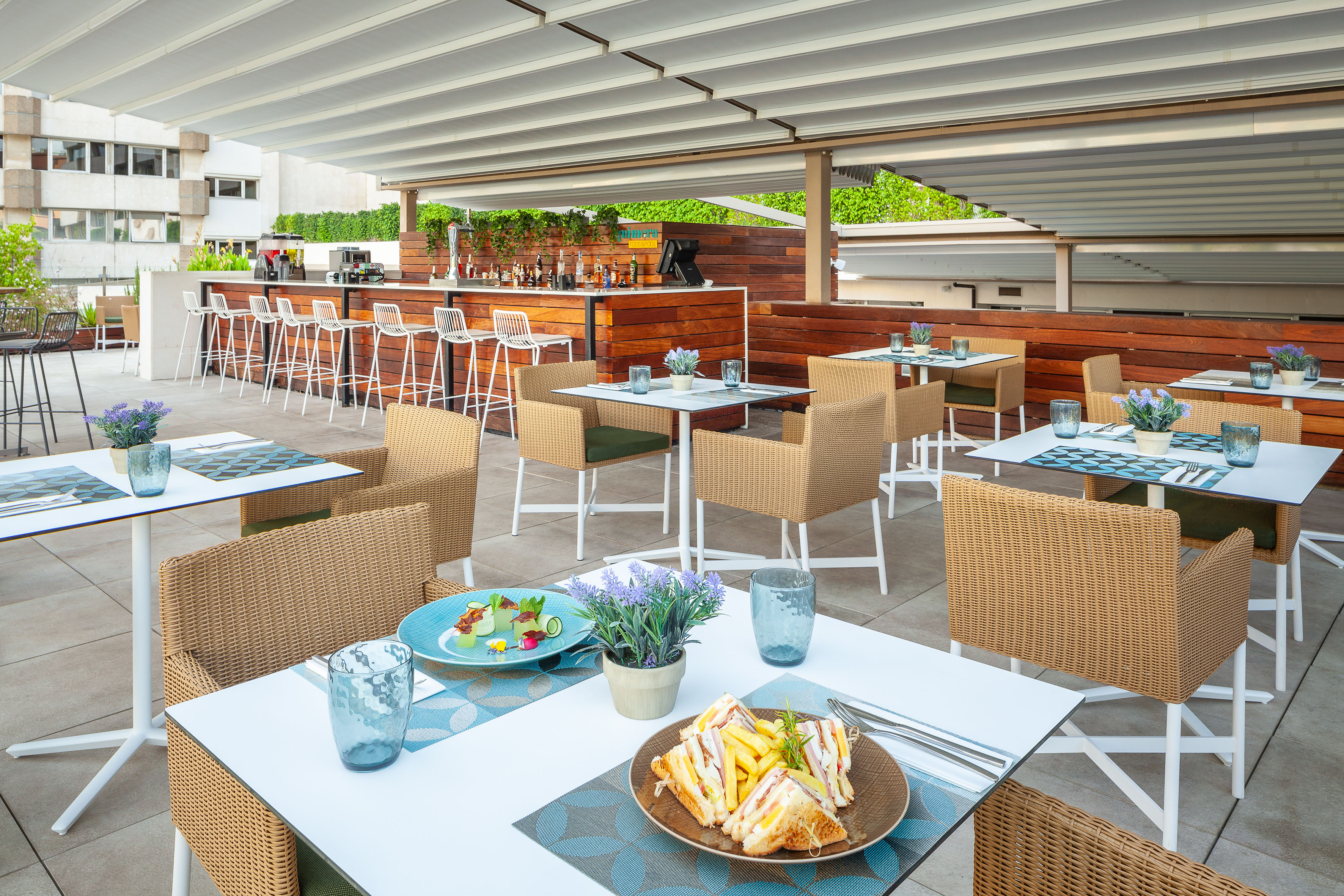 a table and chairs with food on it