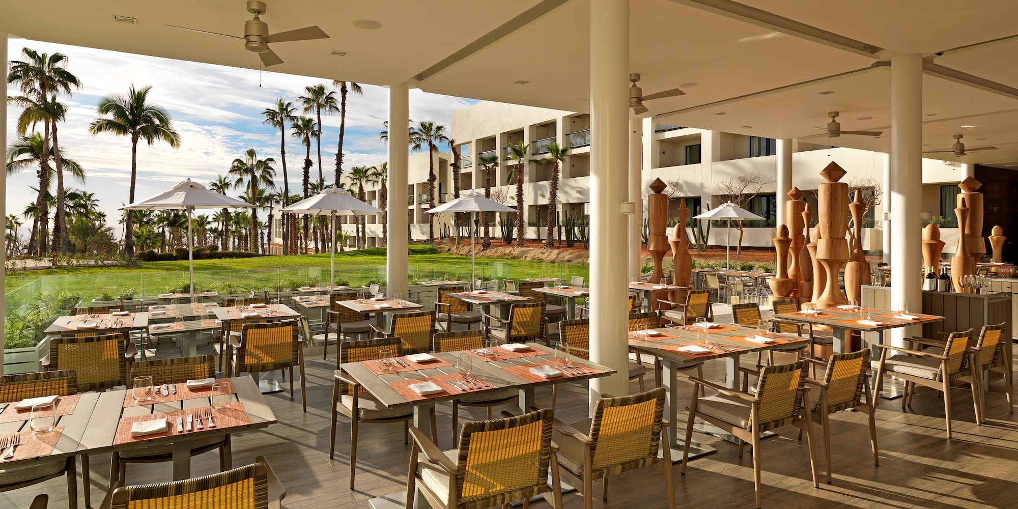 a restaurant with tables and chairs