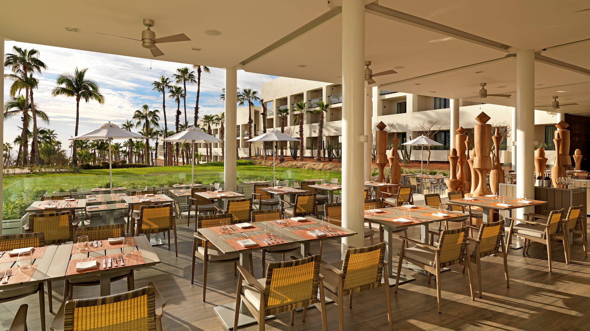 a restaurant with tables and chairs