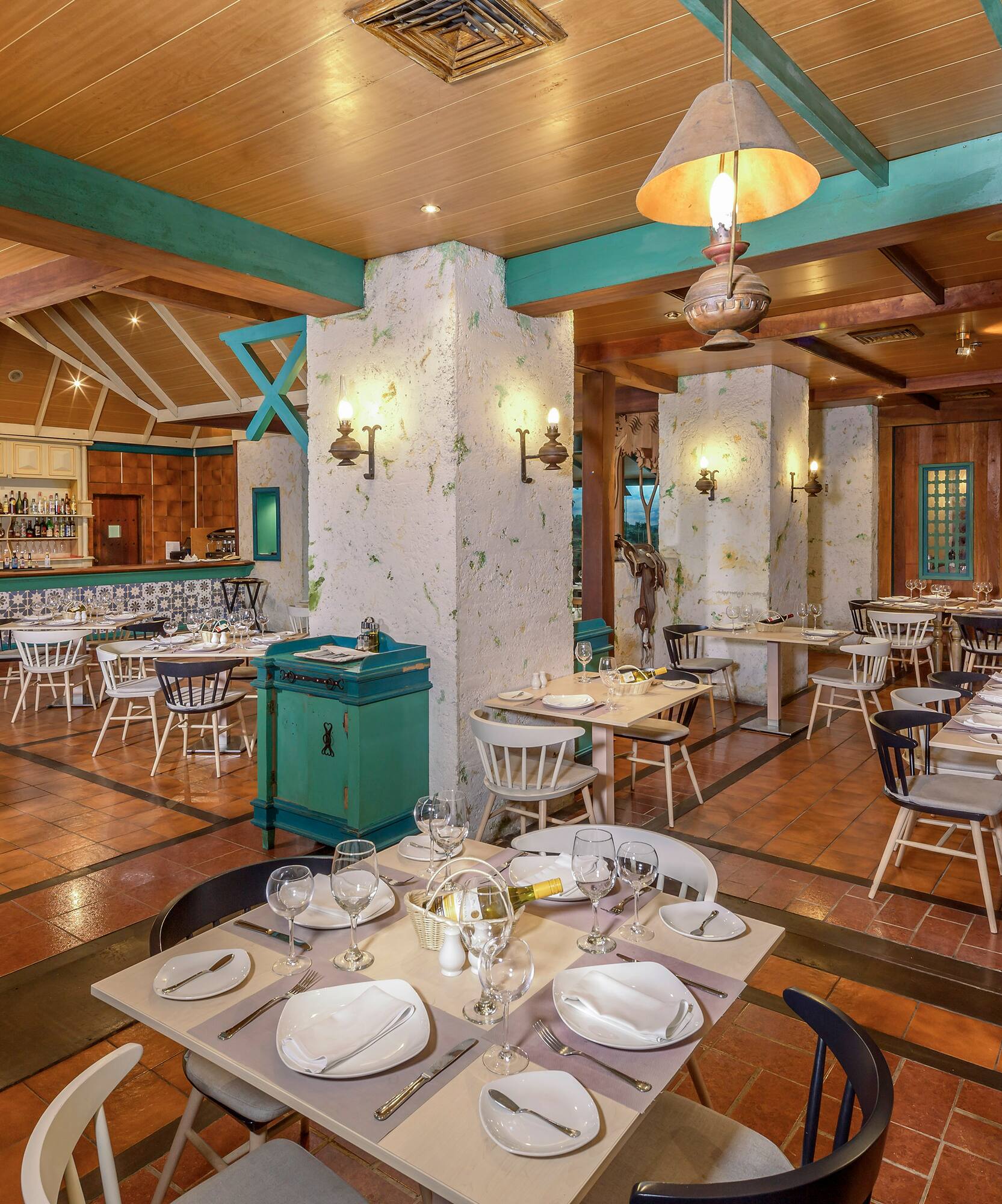 a restaurant with tables and chairs