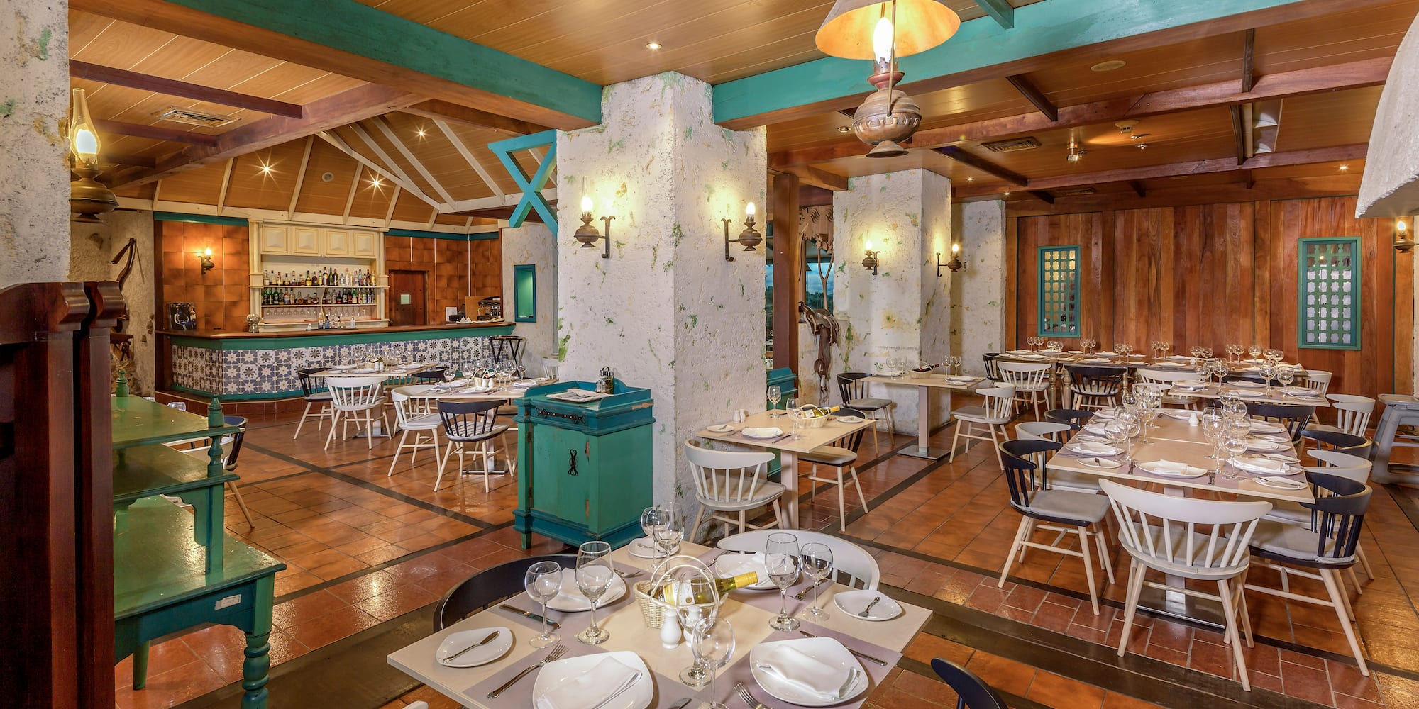 a restaurant with tables and chairs