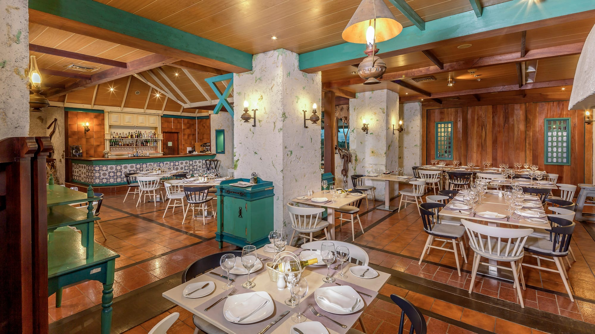 a restaurant with tables and chairs