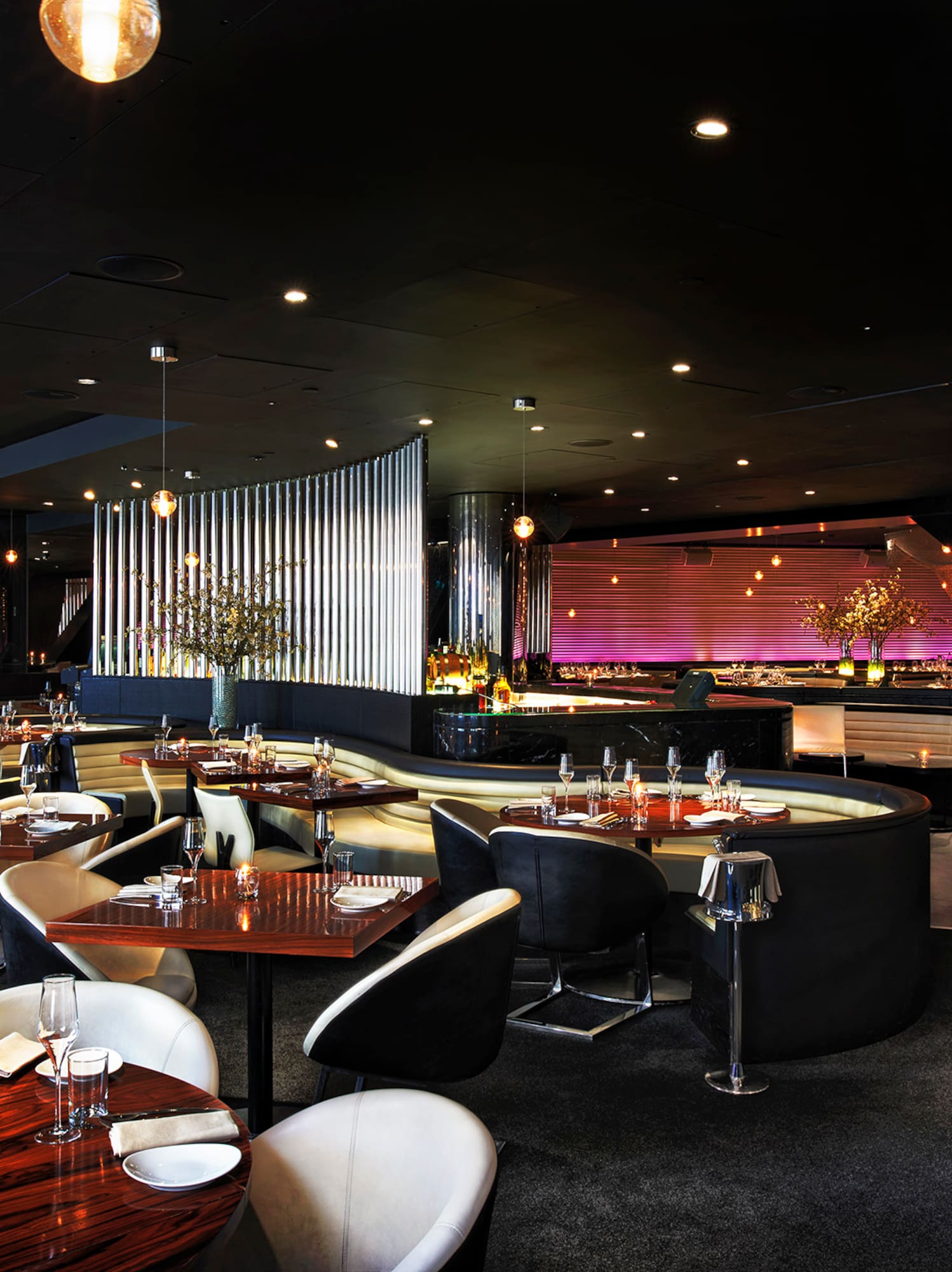 a restaurant with tables and chairs