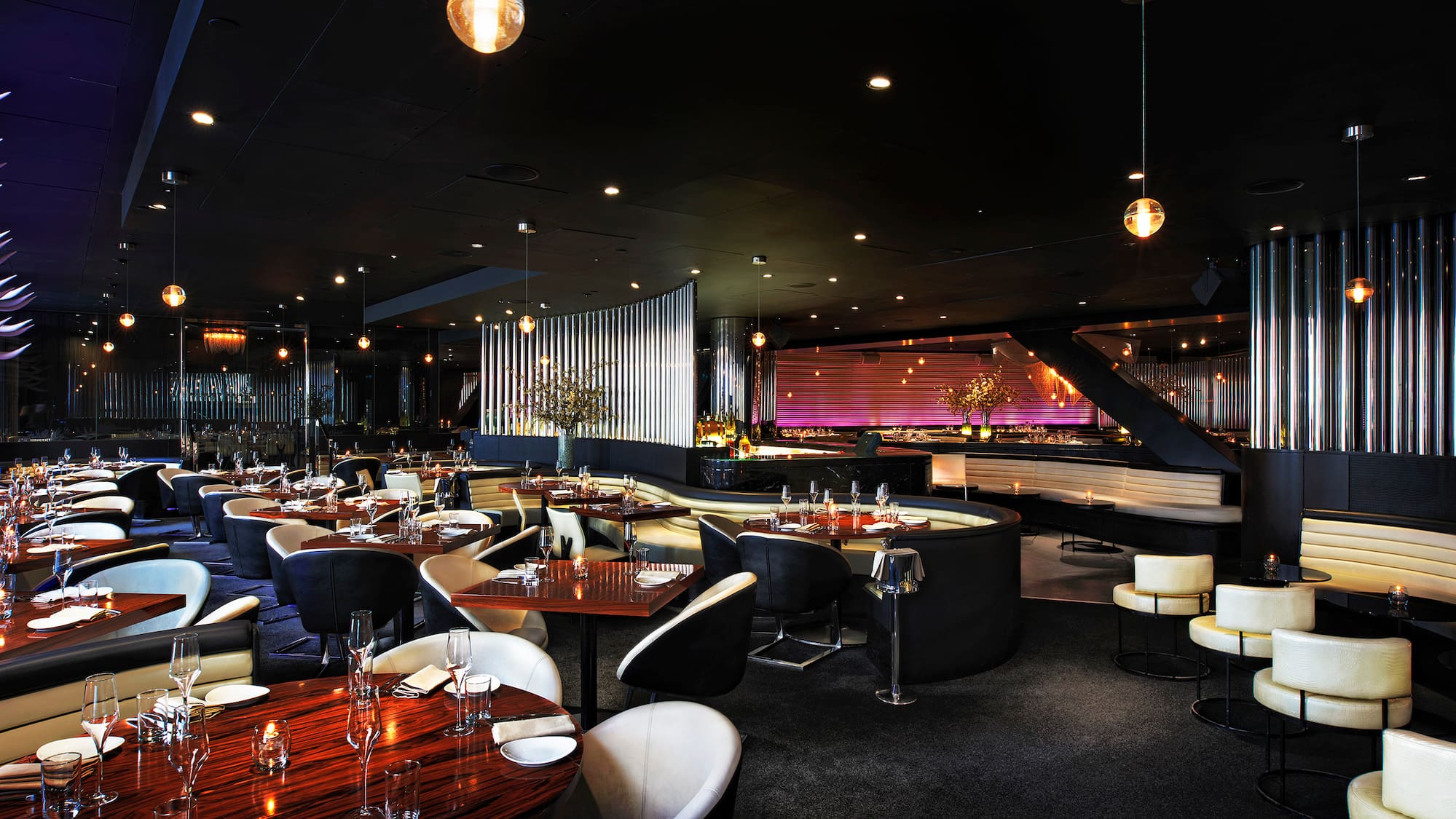 a restaurant with tables and chairs