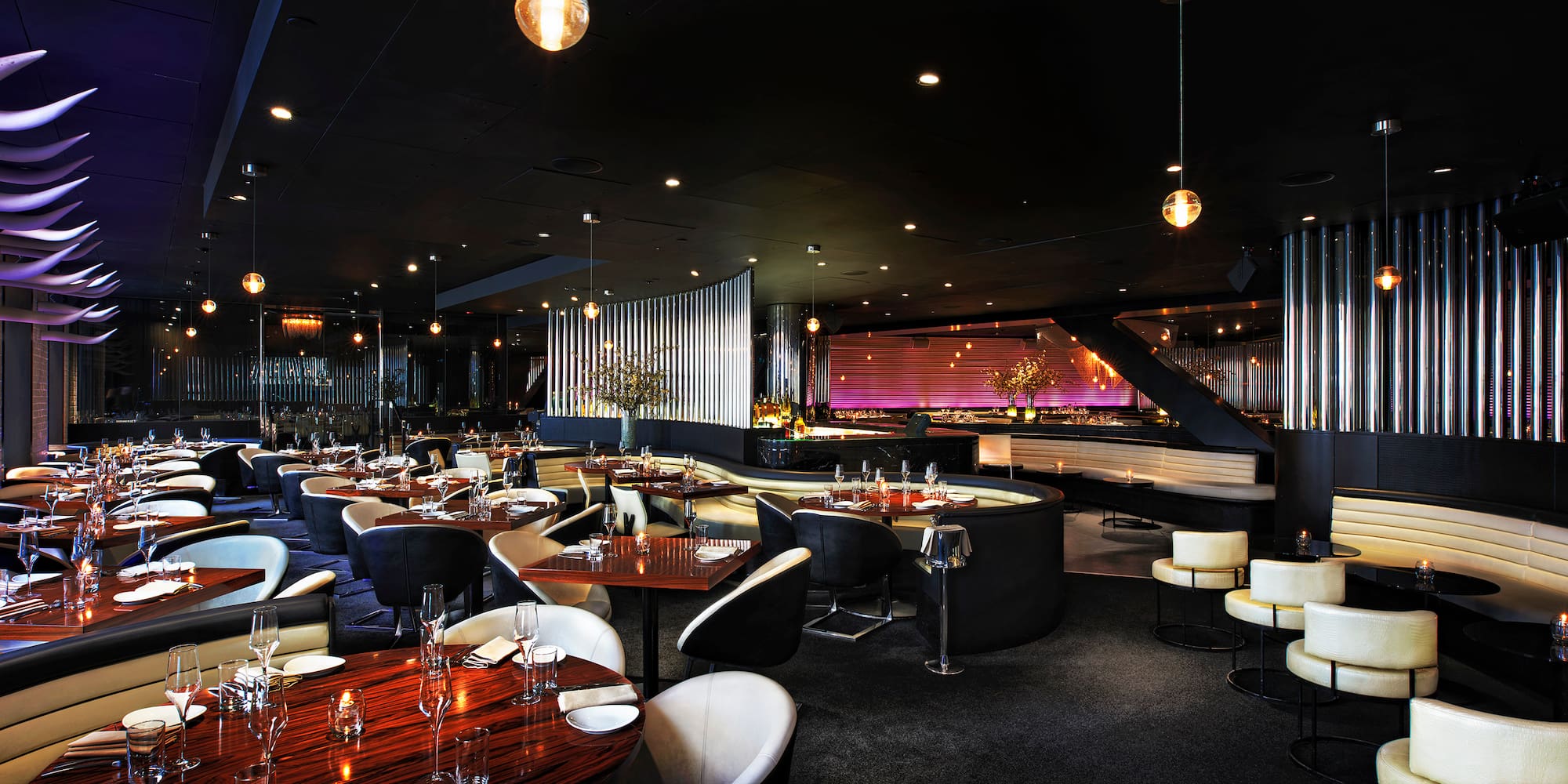 a restaurant with tables and chairs