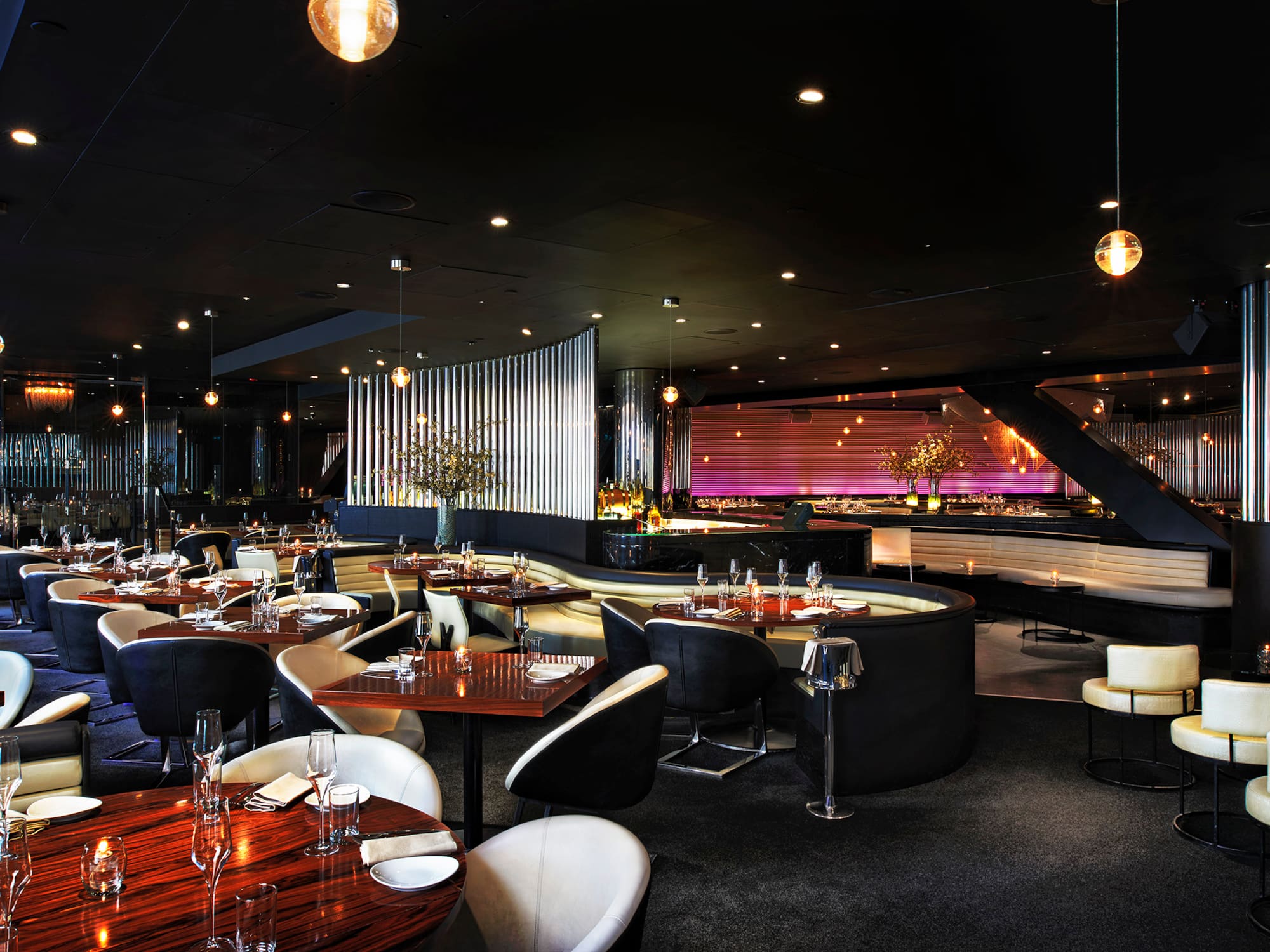 a restaurant with tables and chairs