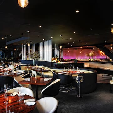 a restaurant with tables and chairs