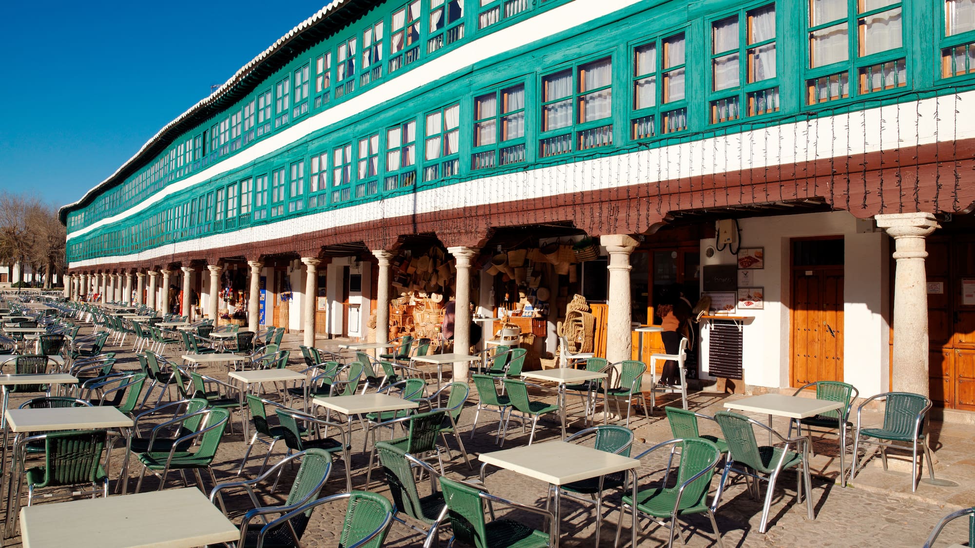 a building with tables and chairs