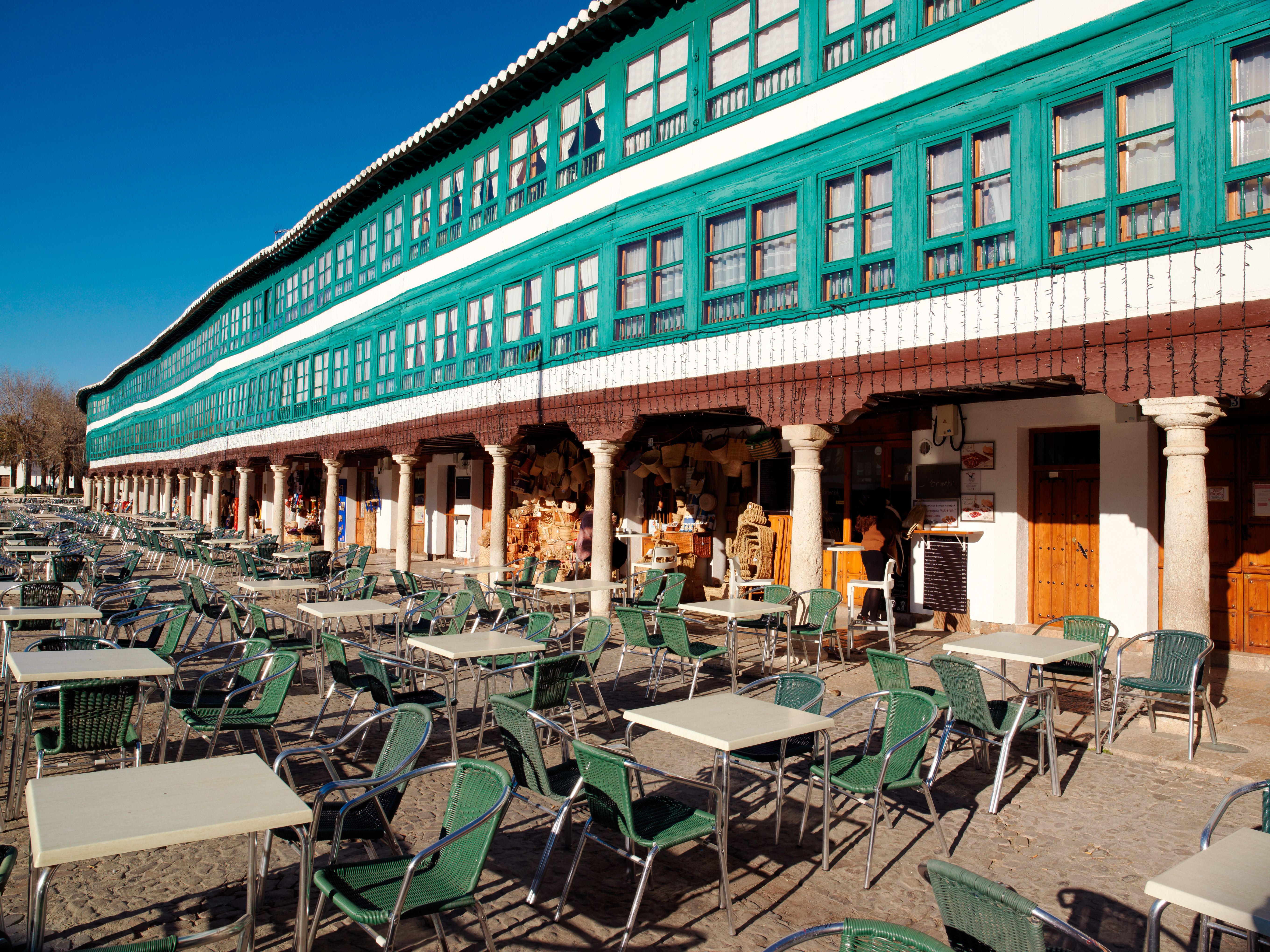 a building with tables and chairs