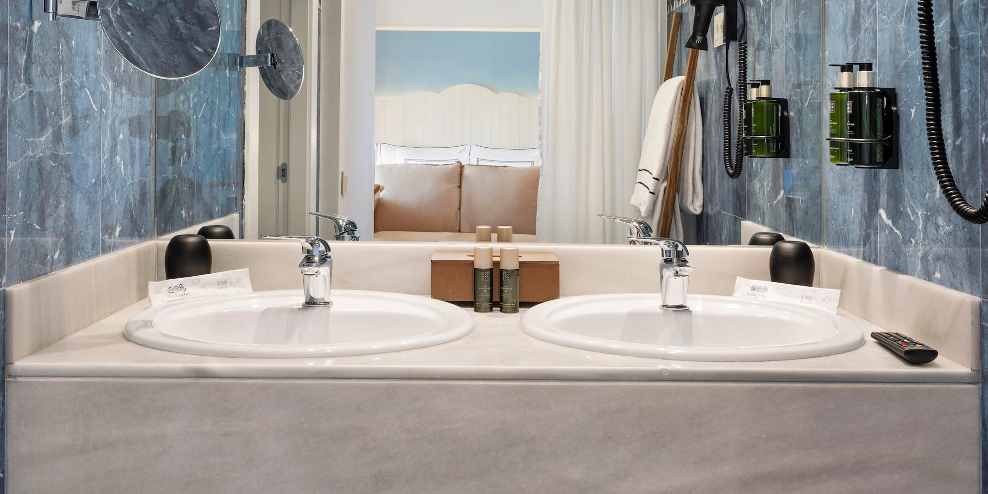 a bathroom with two sinks