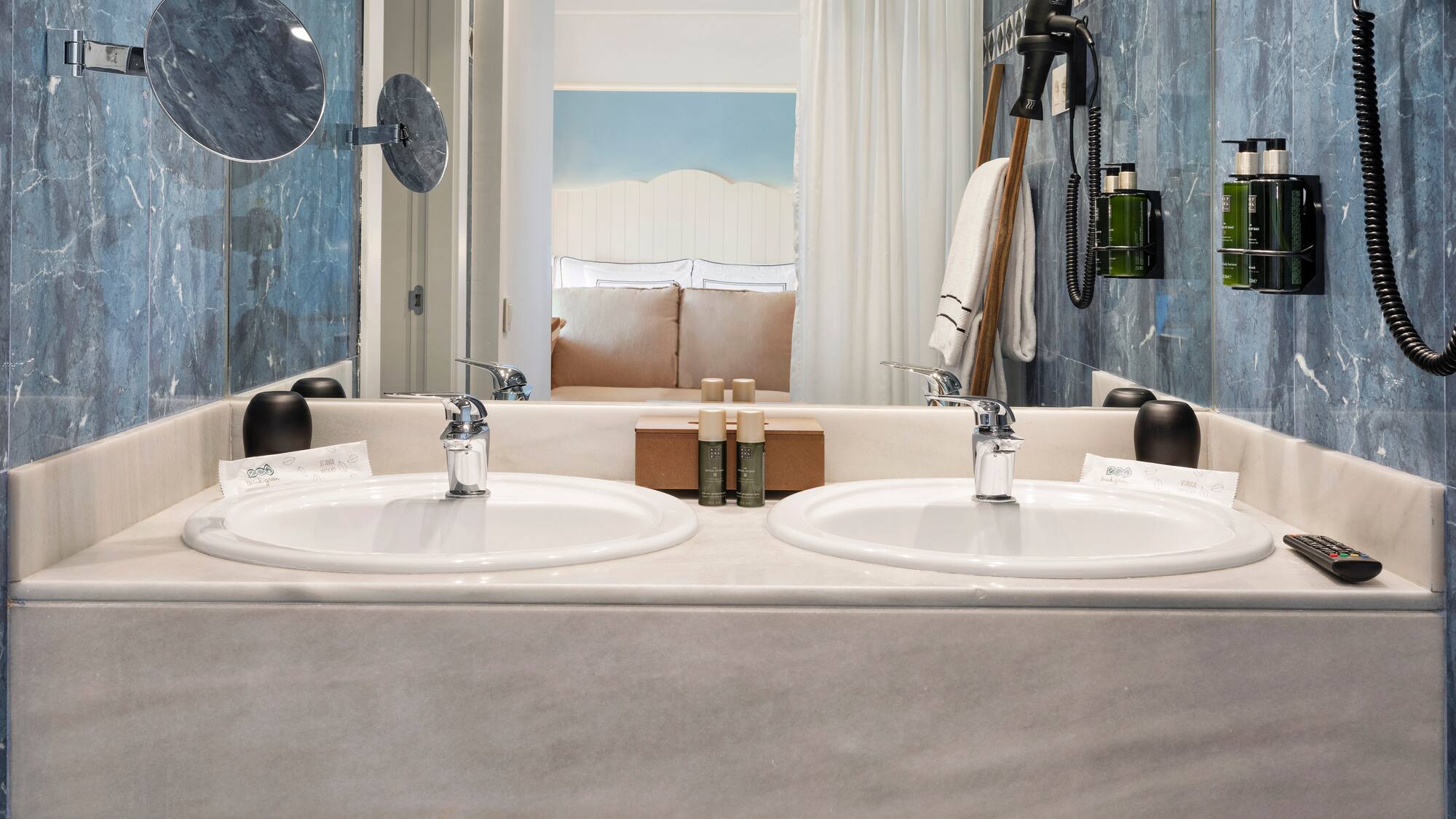 a bathroom with two sinks