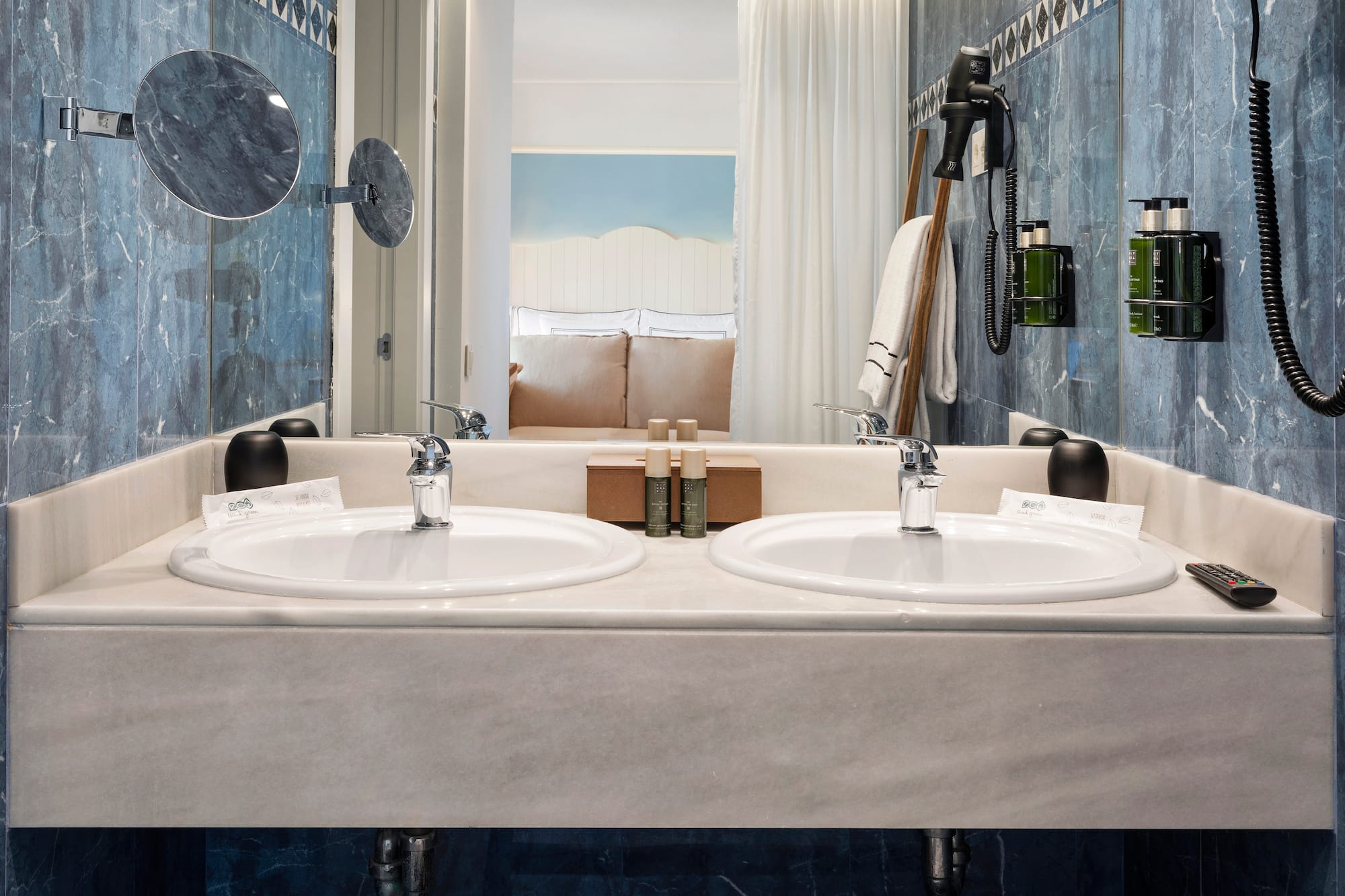 a bathroom with two sinks