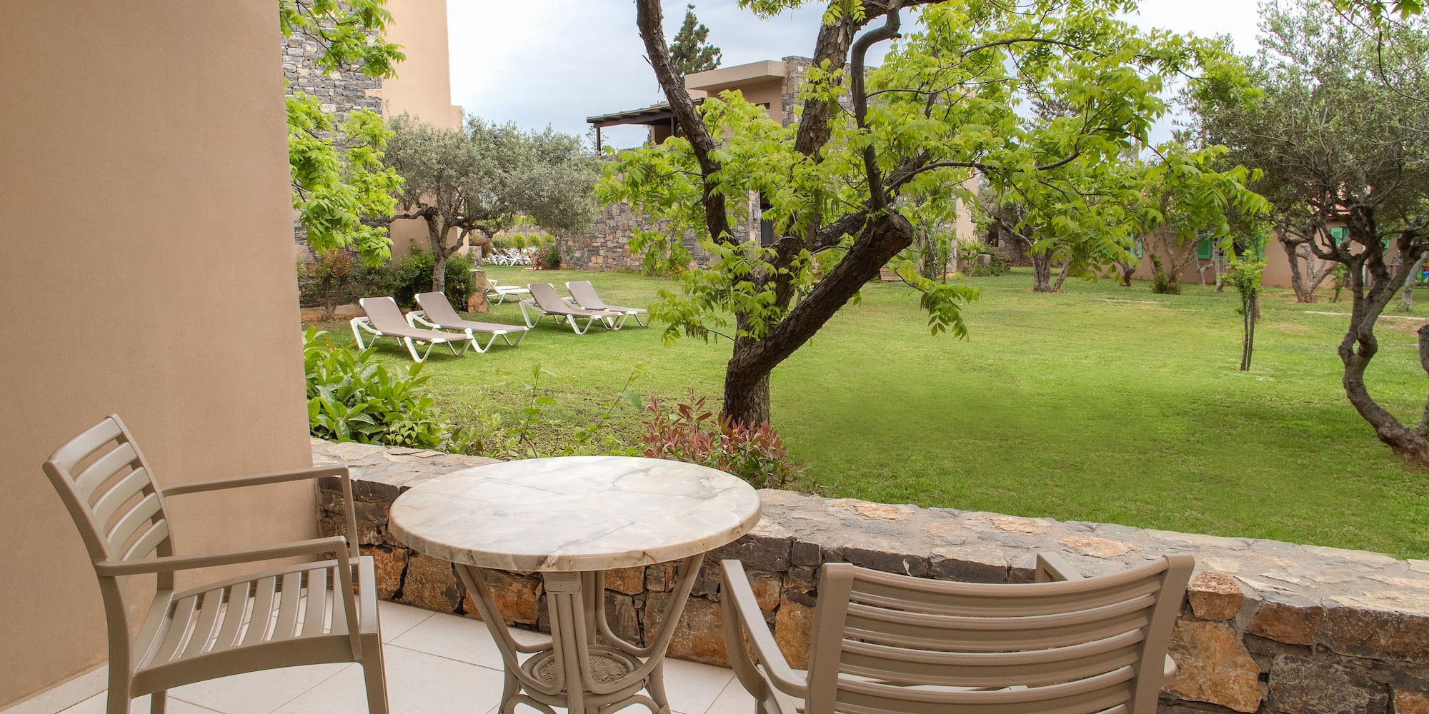 a table and chairs on a patio