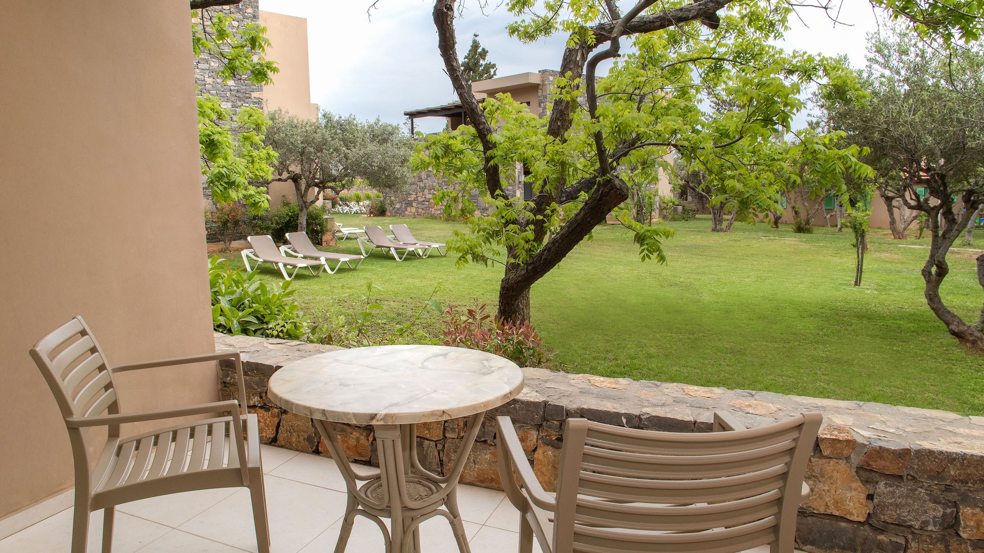 a table and chairs on a patio