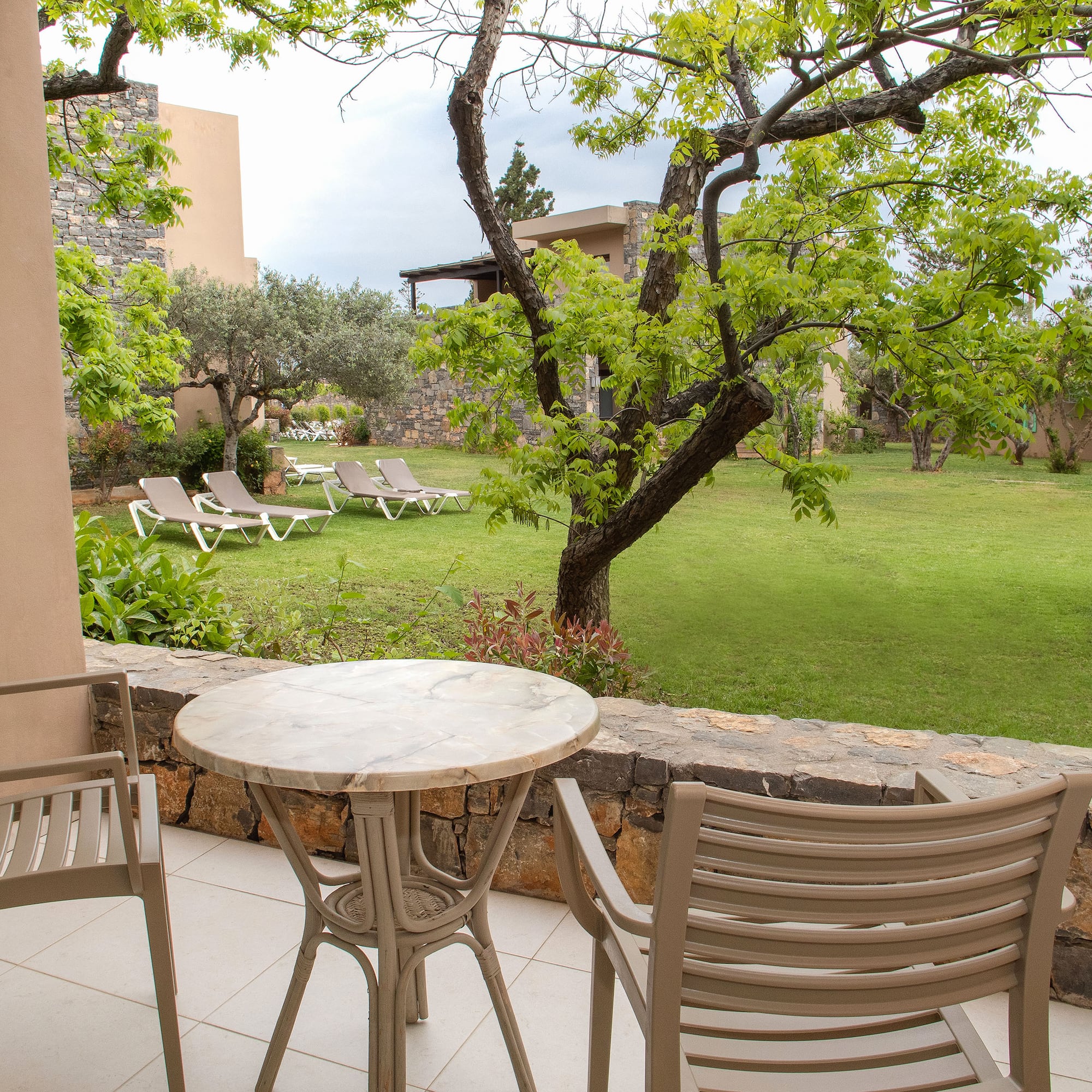 a table and chairs on a patio