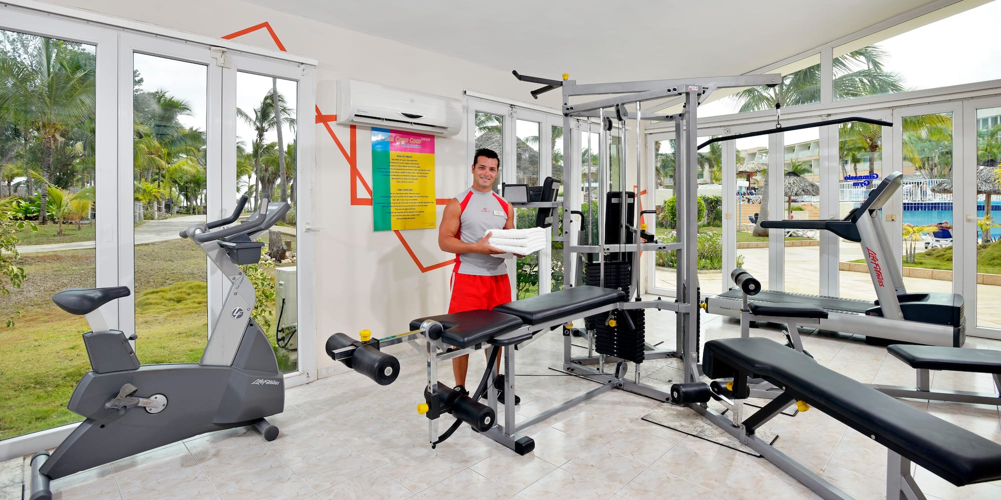 a man standing in a gym