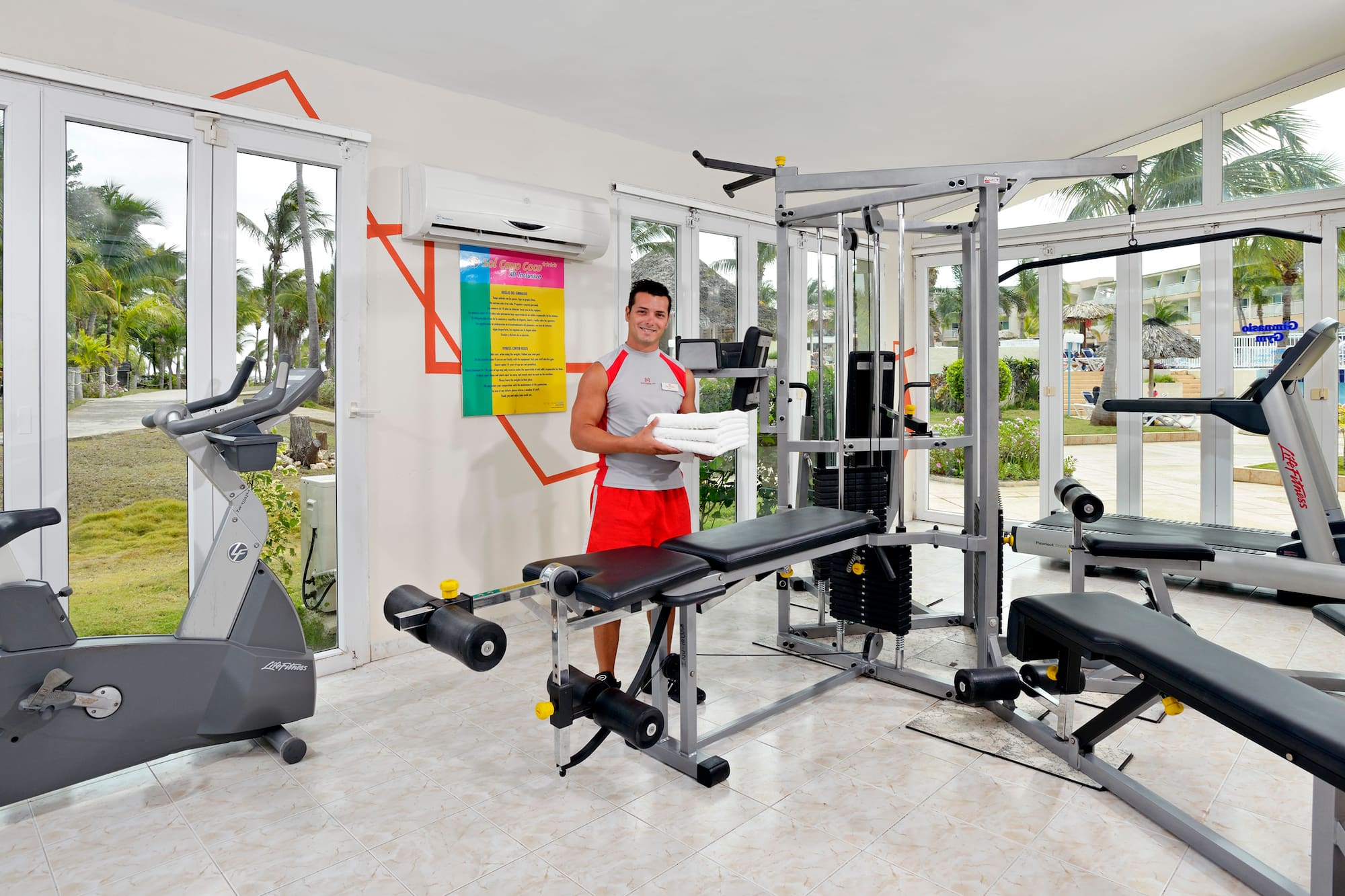 a man standing in a gym