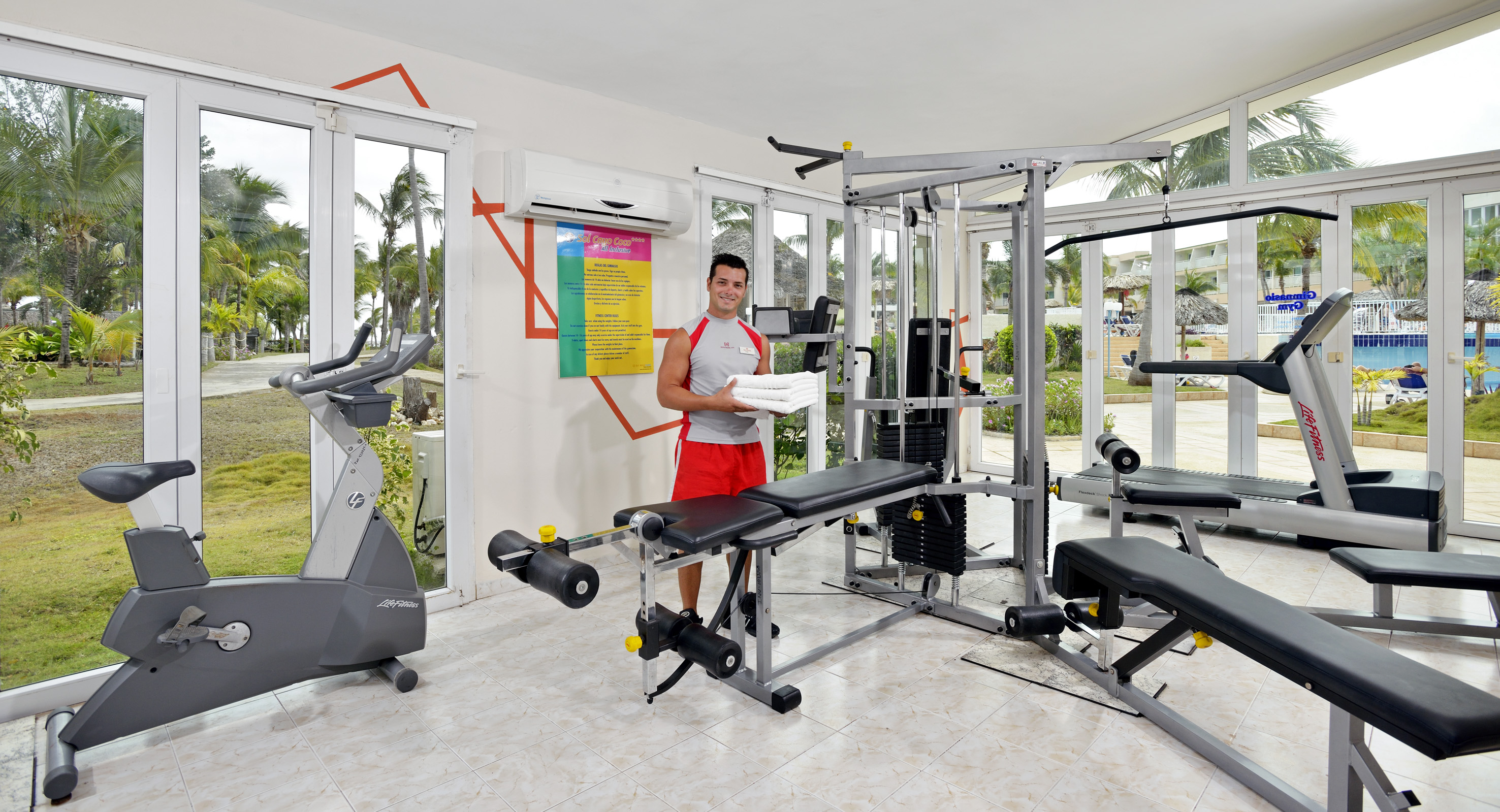 a man standing in a gym