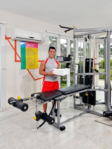 a man standing in a gym