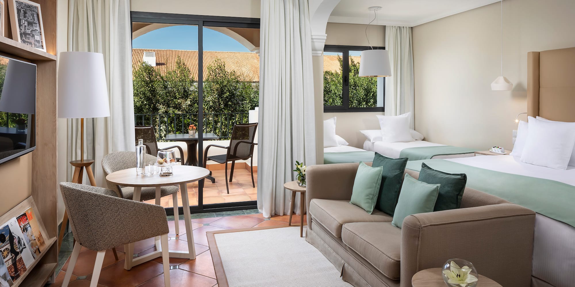 a room with a bed and a sofa