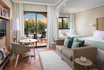 a room with a bed and a sofa