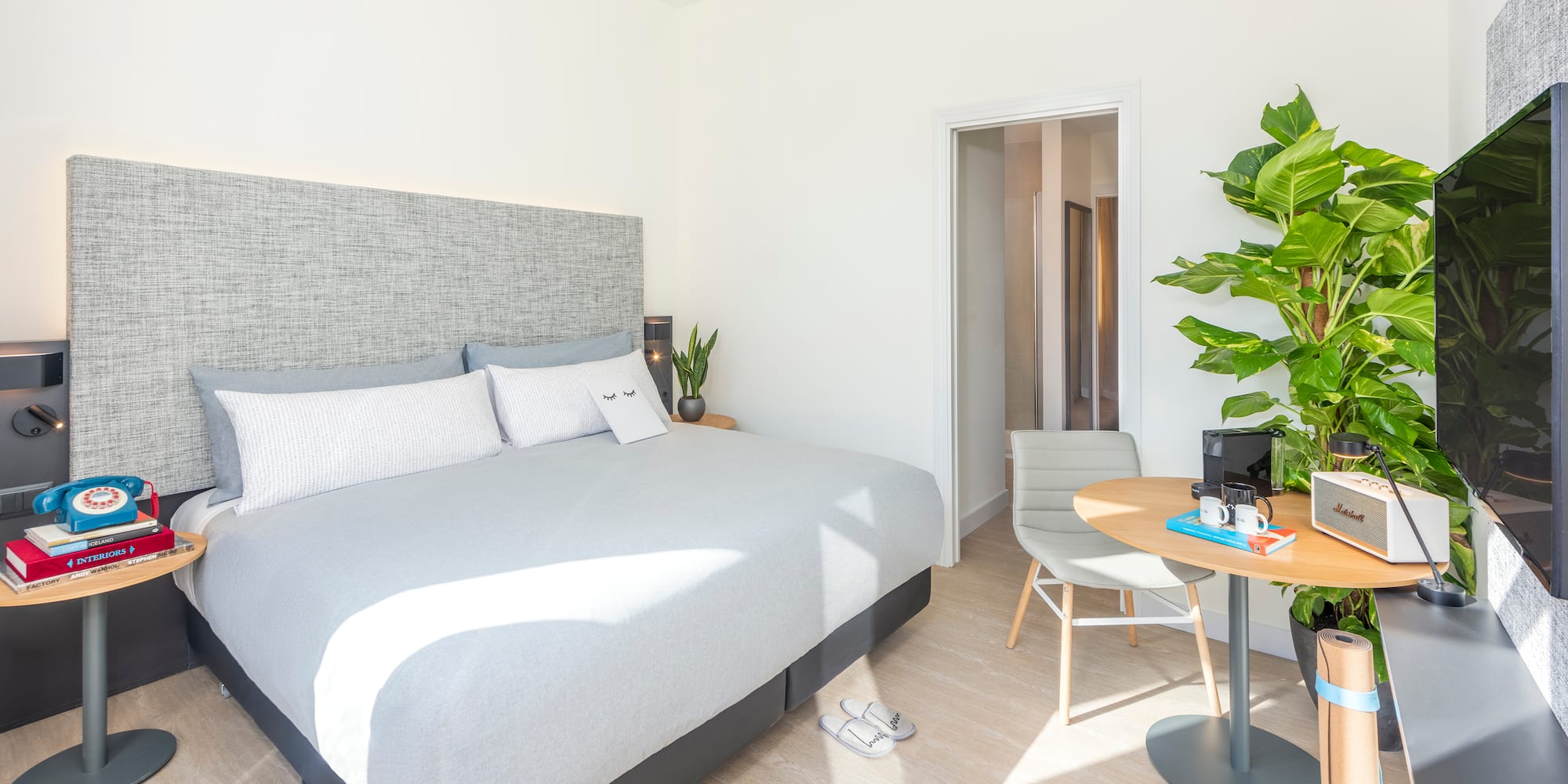 a room with a bed and a table